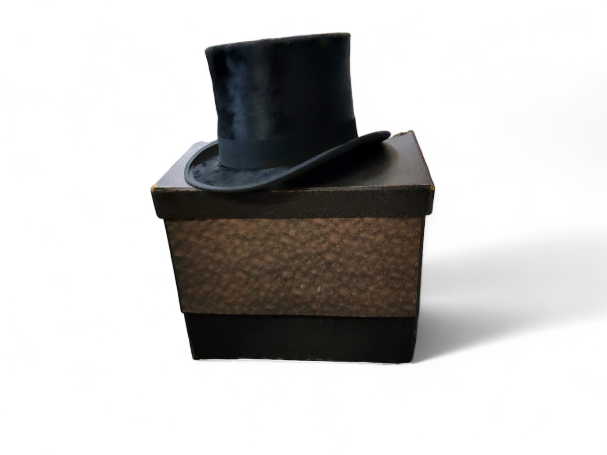 A Dunn & Co top hat, approx 6 3/4, 20cm x 16cm, cardboard box