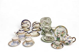 A Paragon part tea service, printed and painted with fanciful birds and foliage, comprising five