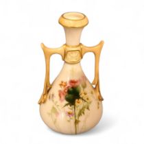 A Royal Worcester two handled vases, printed and painted with thistles, on a blush ivory ground,