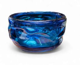 A Whitefriars style knobbly blue glass bowl, 24cm diameter