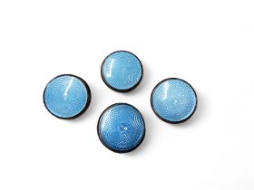 A set of four silver and enamelled buttons, marked Sterling Silver, c.1900