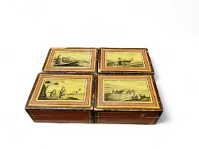 A set of four 19th century rectangular counter box, the covers decorated with farmer, milk maid,