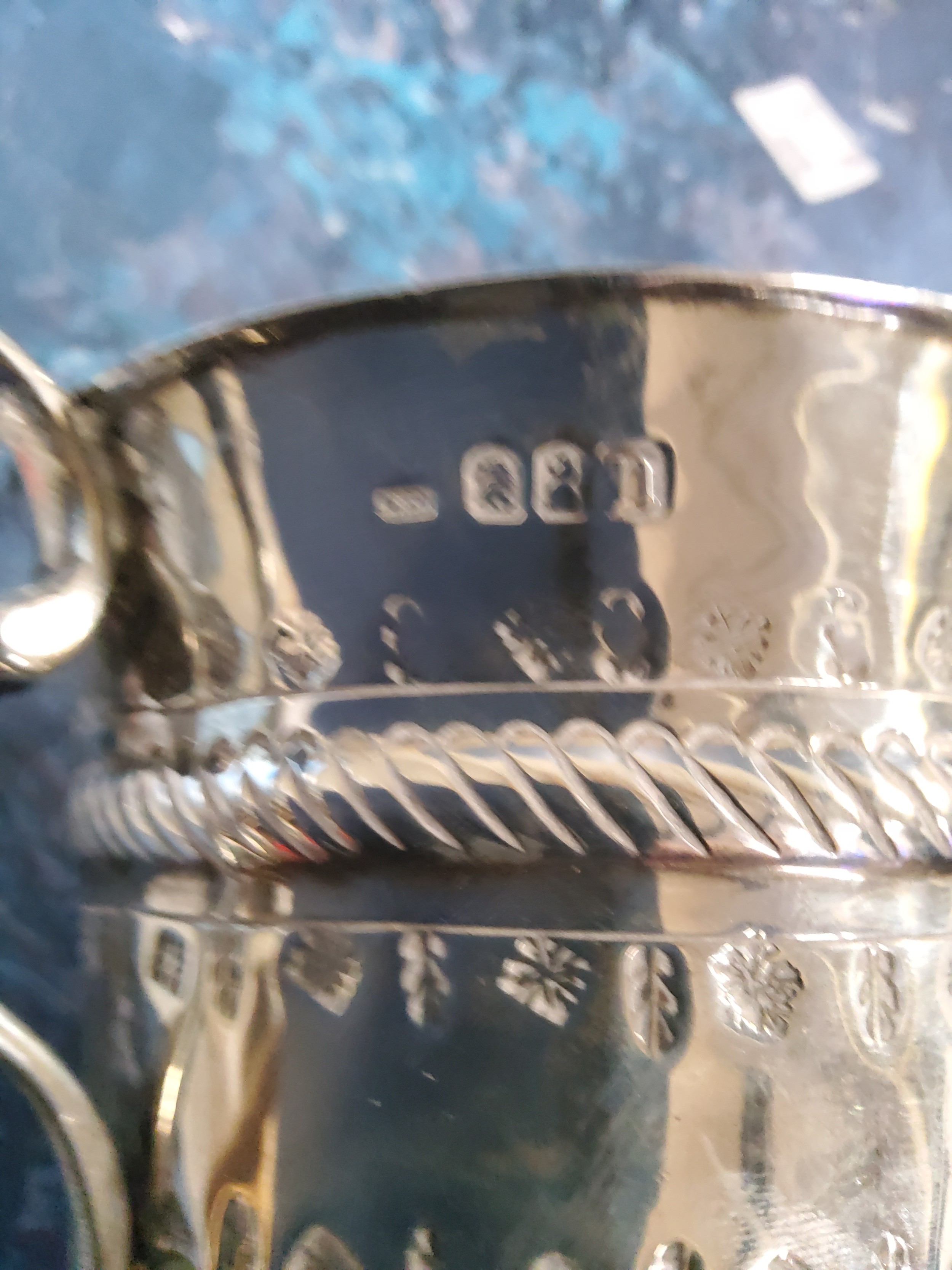 A Queen Anne Britannia standard silver porringer, with fluted and punched vacant cartouche, embossed - Image 3 of 4