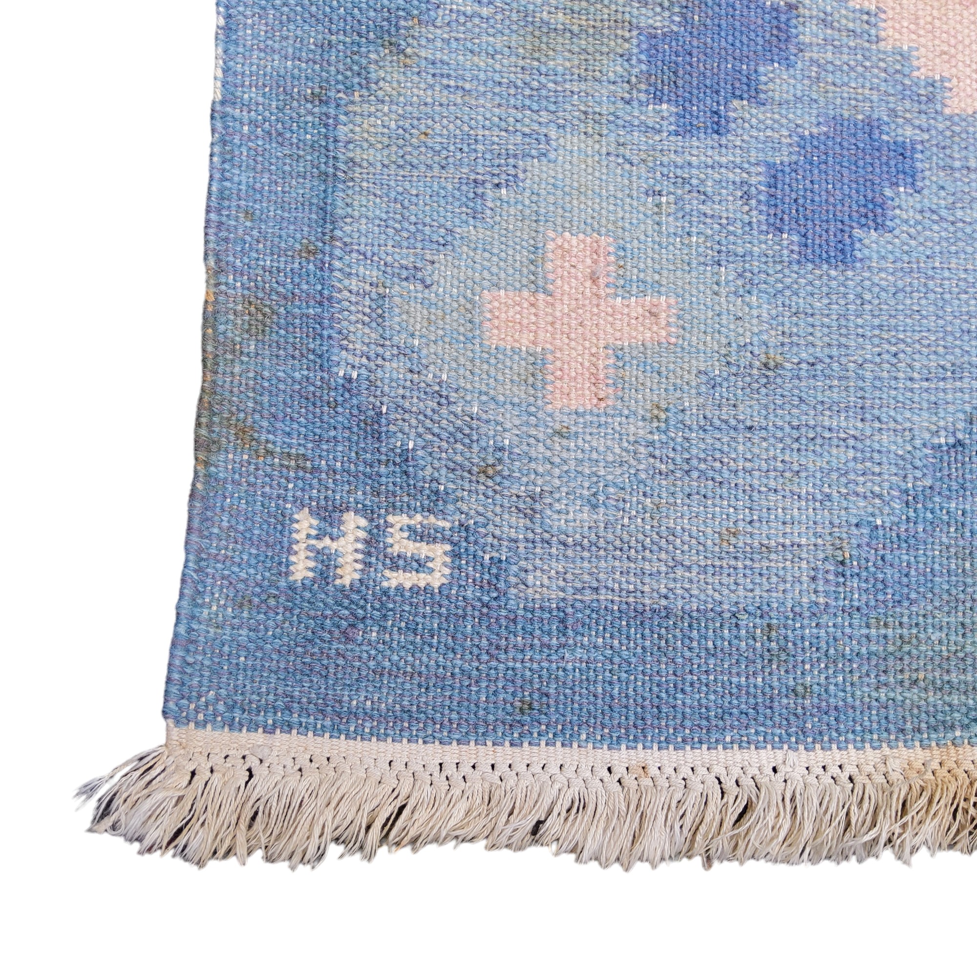 A Swedish flat weave carpet, signed by Svensk Hemslöjd “SH” in pastel tones, 138cm wide x 200cm - Image 2 of 3