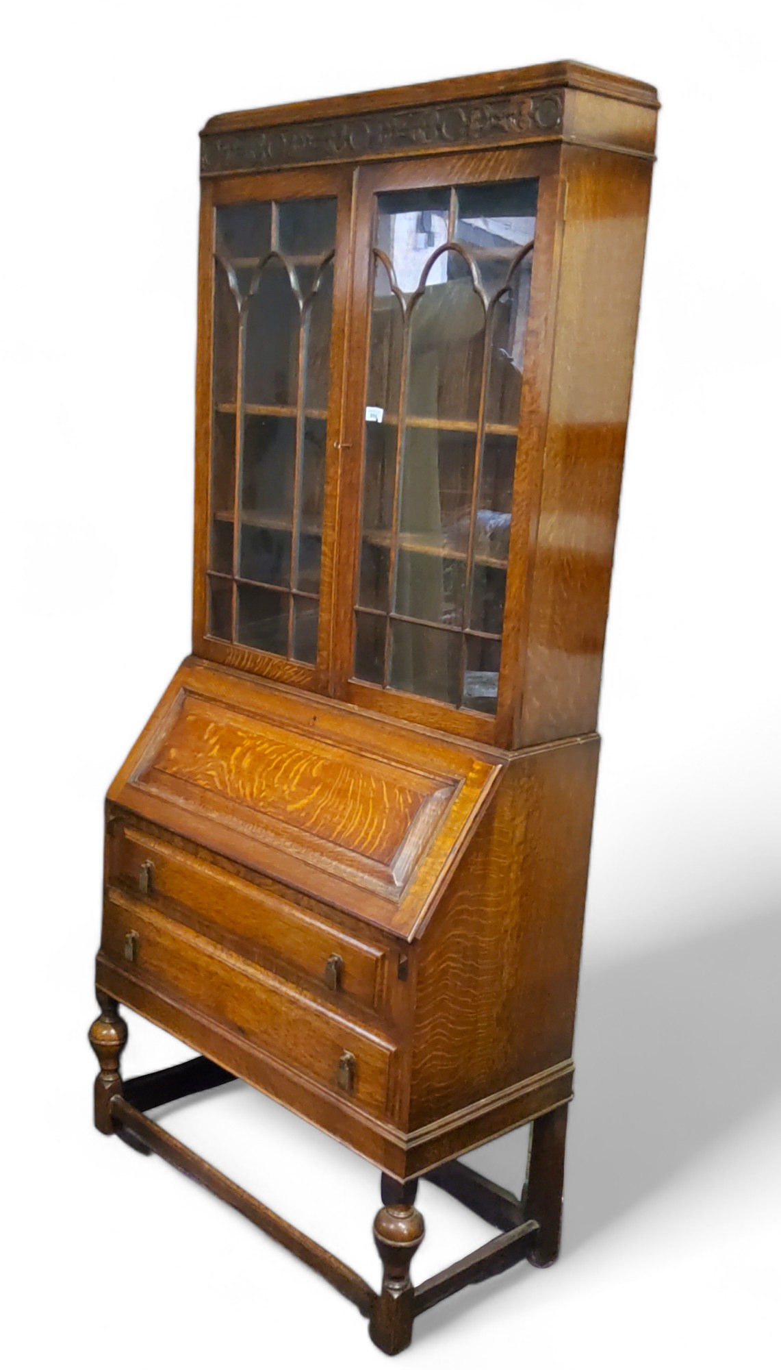 An early 20th century oak bureau display cabinet, 205cm high, 89cm wide, c.1930