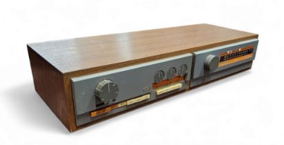 A Quad 33 amplifier and Quad FM 3 tuner, in teak case