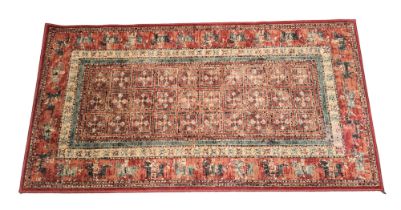 A Royal Keshan woollen rug, pazyryk red ground with geometric pattern, 160cm x 83cm