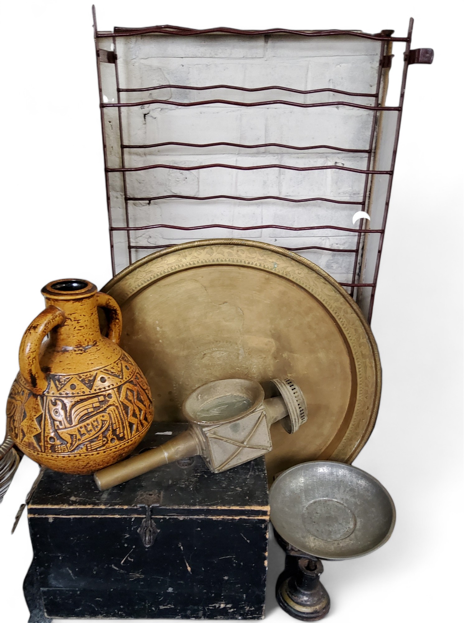 A metal shoe rack;  a set of scales;  coaching lamp;  tools;  etc