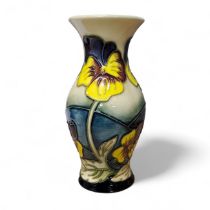 A contemporary Moorcroft  Pansy Parade vase, designed by Kerry Goodwin, tube lined with yellow and