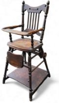 A late 19th century oak high chair, spindle back, turned legs, pad feet.