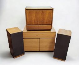 A Tapley 33 teak cupboard, long drawer over two doors; a Calinda vertical speaker; etc