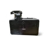 A mid 20th century black bakelite receptionist telephone, c.1940;  an early 20th century storage