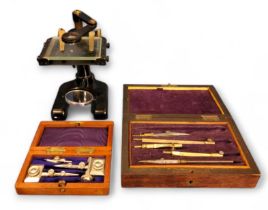 A black-lacquered Watson & Sons 'Universal' dissection microscope, 77586;   a 19th century drawing