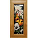 A contemporary Moorcroft Miss Alice  rectangular plaque,  designed by Emma Bossons, tubed lined with