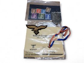 Third Reich stamps;  Nazi Cholm 1942 shoulder badge; Nazi German Army SS  uniform cloth eagle badge;