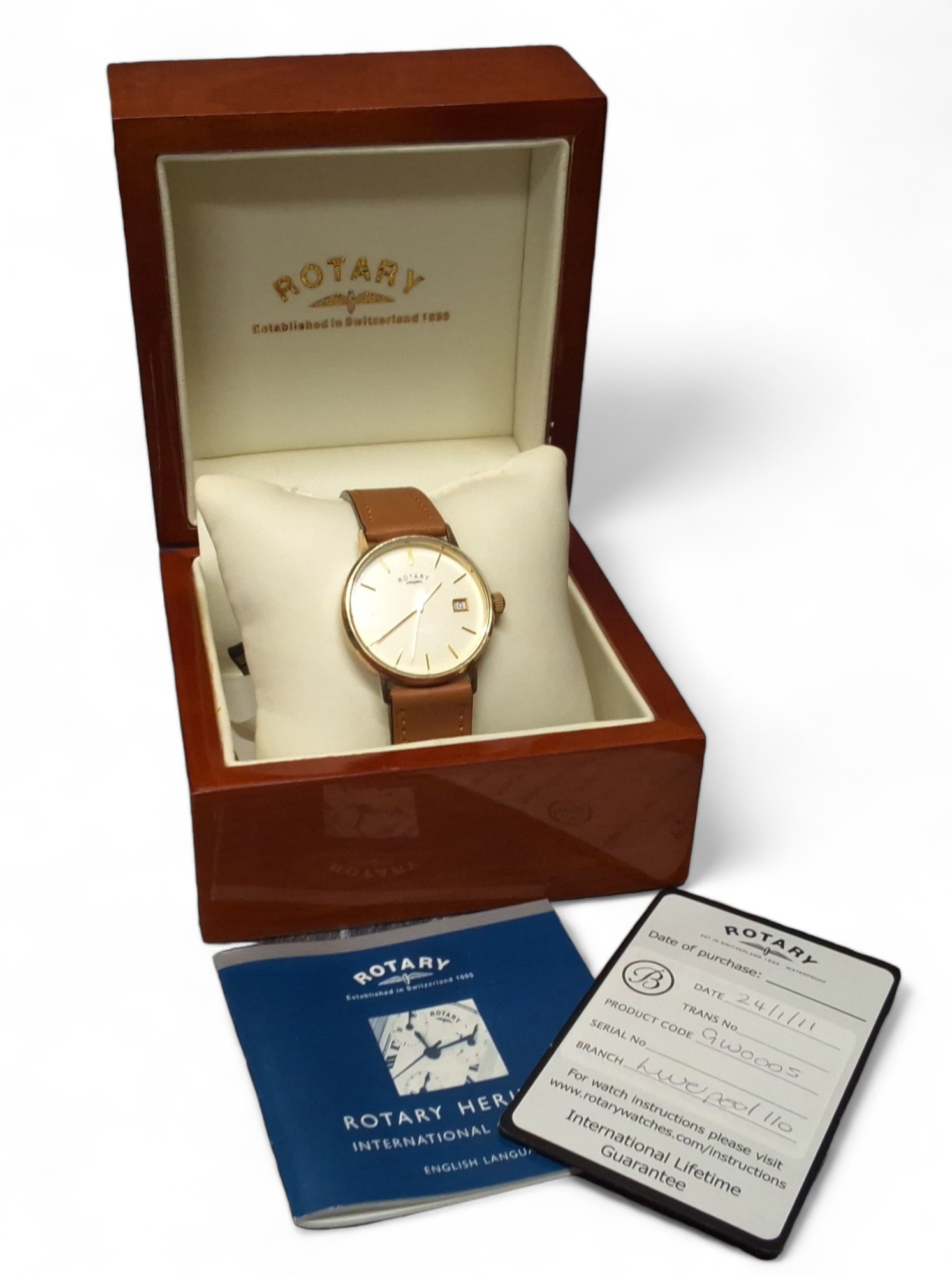 A 9ct gold Rotary gentleman's wristwatch, quartz movement, cream dial gold baton markers, date