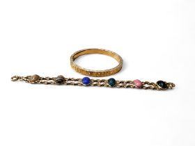 A  bracelet, set with six scarab stones, 19cm long;  a gilt metal bangle (2)