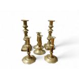 A  George II/George III brass alloy socket candlesticks,  petalled bases, side ejector, 17cm high,