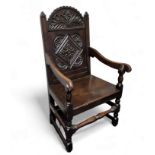 A 17th century style English oak wainscote chair,