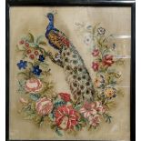 A Victorian woolwork tapestry, embroidered with peacock amongst flowers and foliage, 53cm x 48cm