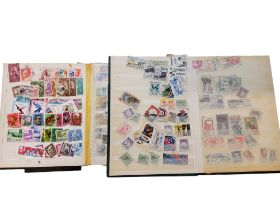 Philately - a school boy's stamp album, 1960 - 1980;  another;   ten unmounted mint 5d stamps RMS