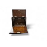 An Edwardian oak stationery box, folding front, fitted interior, 24.5cm high, c.1880