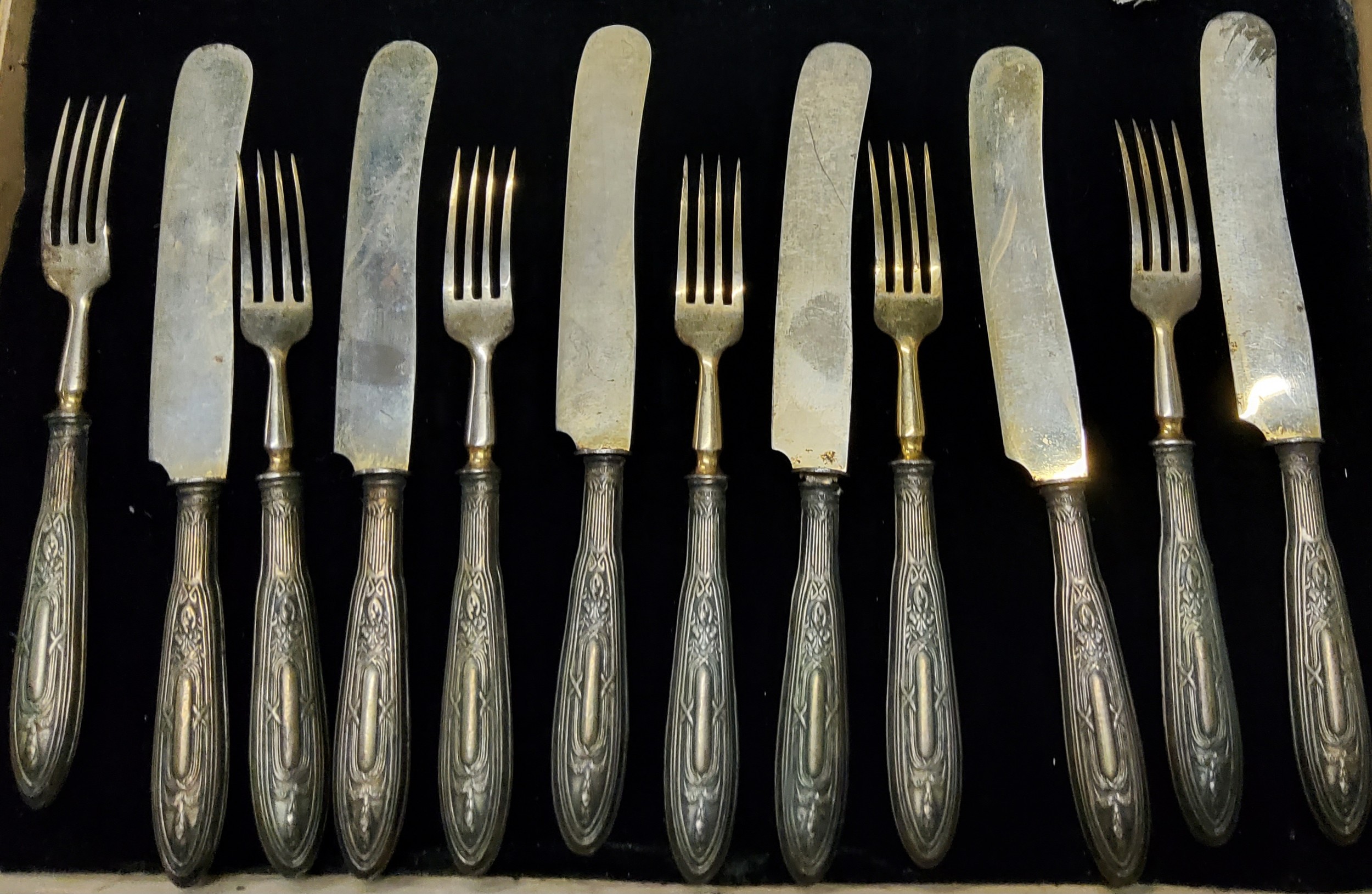 A set of six Continental silver hafted fruit knives and forks, early 20th century