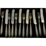 A set of six Continental silver hafted fruit knives and forks, early 20th century