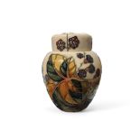 A contemporary Moorcroft Bramble pattern ginger jar and cover, tube lined with berries and leaves,