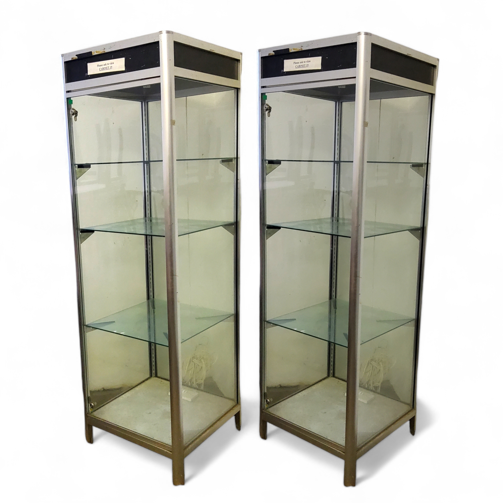 Two tall metal and glass display cabinets, 191cm high x 60cm wide x 62cm deep  Please Note: