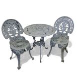 An outdoor cast metal bistro table and chairs for two