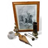 An early 20th century brass fireside set;  bellows;  oil lamp; Lord Baden Powell, monochrome