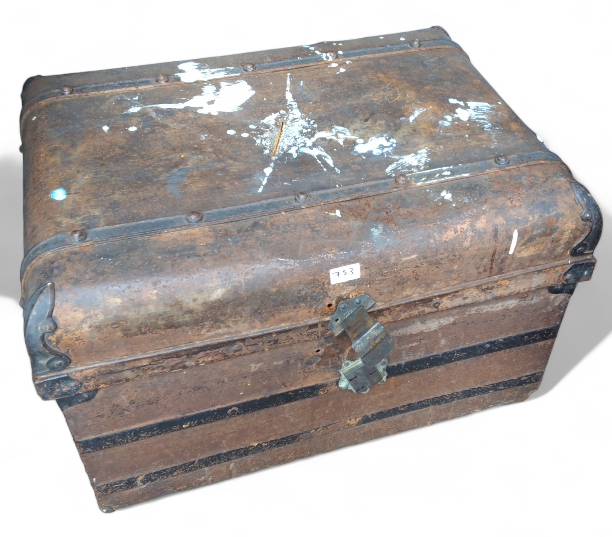 An early 20th century tin trunk, 50cm high, 74cm wide