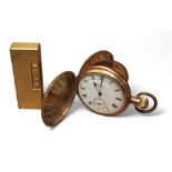 A Dunhill goldplated lighter; a gold plated full hunter pocketwatch, side winder movement stamped