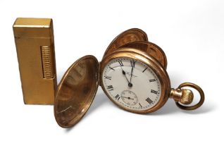 A Dunhill goldplated lighter; a gold plated full hunter pocketwatch, side winder movement stamped