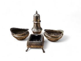 A pair of silver boat shaped salt cellars, embossed with flutes, 5.5cm wide, Birmingham 1909;  a