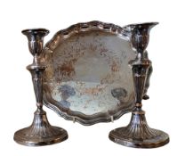 A Sheffield Plated shaped circular tray, engraved with foliate scrolls, scroll feet, 29cm diam, c.