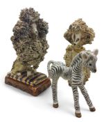 A Basil Matthews model of a zebra, 9.75cm high, painted mark;  a Basil Matthews poodle, applied with