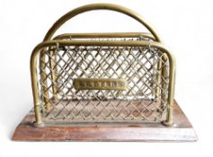 An Edwardian brass and oak letter rack, wirework sides, inscribed Letters, 15cm wide, c.1910