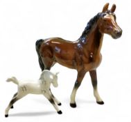 A Beswick grey foal, printed mark;   a West German bay mare (2)
