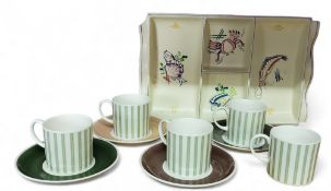 A set of five Susie Copper bone china coffee cups and saucers. with vertical green bands, printed