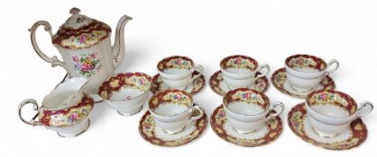 A Paragon Pompadour pattern coffee service, for six, comprising coffee pot, milk jug, sugar bowl,