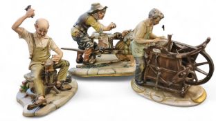 A Capo-Di-Monte figure group, The Knife Sharpener, by IPA, 17cm wide, painted blue Naples mark;