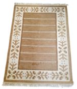 Mid 20th Century Design - a Swedish rug, neutral hessian brown ground surrounded by a cream,