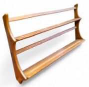 A mid 20th century Ercol 'Golden Dawn' model plate rack, 50cm x 97cm x 14cm