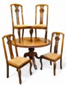 A 'Victorian' flamed mahogany circular centre table, boldly turned support, trio of fluted