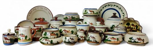 Torquay and Devon Ware - teapots, dishes, jugs, cups and saucers, painted with cottage