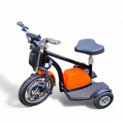 An electric three wheeler scooter, black and orange livery, untested