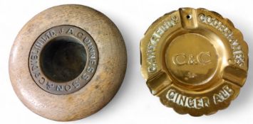 A Guinness Sons Co (Dublin) Ltd wooden and brass ashtray, 13cm diam;  a Cantrell & Cochrane's Ginger