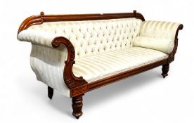 A Victorian mahogany scroll end sofa, upholstered in cream, boldly turned legs, castors, 97cm x